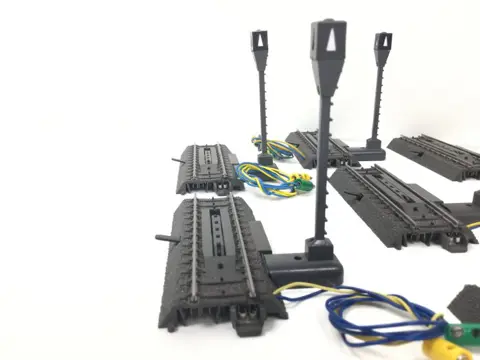 Märklin H0 - 24997/74997 - Rails - Zeven C-Rails ontkoppelrails met mast