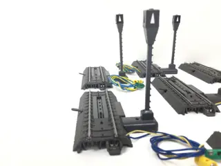 Märklin H0 - 24997/74997 - Rails - Zeven C-Rails ontkoppelrails met mast