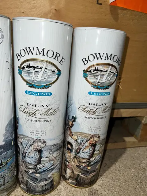Bowmore Legend - collection of 8 empty tins - 70cl - 8 flessen