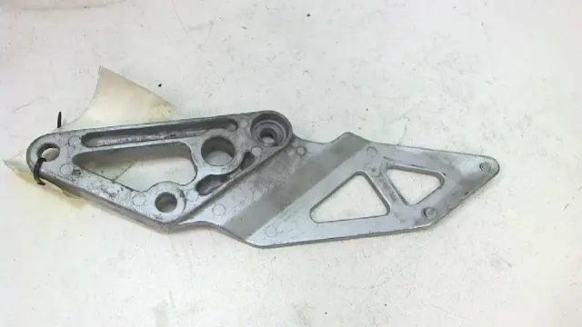 Main step holder left Suzuki GSX R 750 1992 - 1993