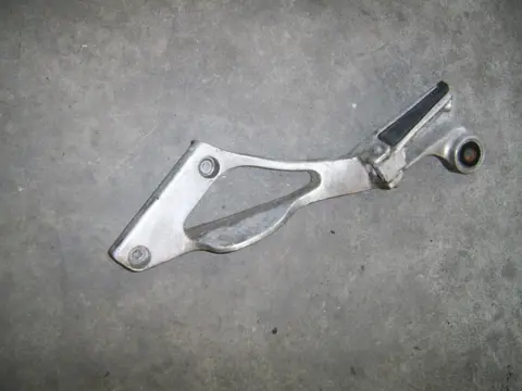 Main step holder left Yamaha TDM 1996 - 2000