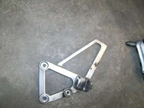 Main step holder left Honda CBR 600 F 1987 - 1990