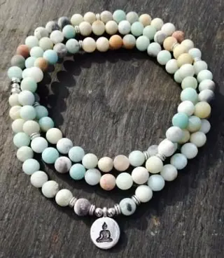 Amazoniet mala met Boeddha bedel