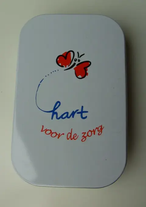 OPBERGBLIK WIT MET OPDRUK “HART VOOR DE ZORG” 150 stuks NIEUW