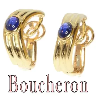 Vintage earclips signed Boucheron set with cabochon sapphires