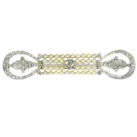 Era's Elegance: Exquisite Diamond and Pearl Brooch from the Dawn of Art Deco