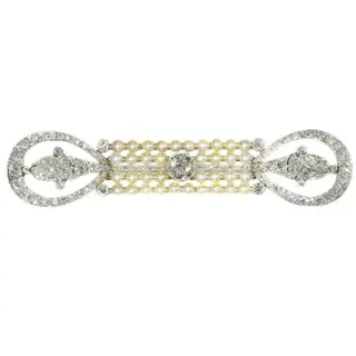 Era's Elegance: Exquisite Diamond and Pearl Brooch from the Dawn of Art Deco