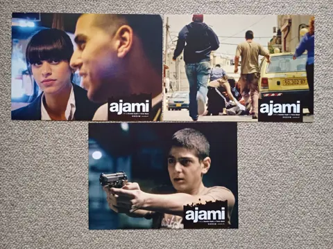 AJAMI     lobbycard set.