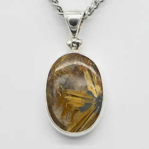 TIBETAANSE HIMALAYA GOUD RUTILEERDE KRISTALKWARTS Cabochon