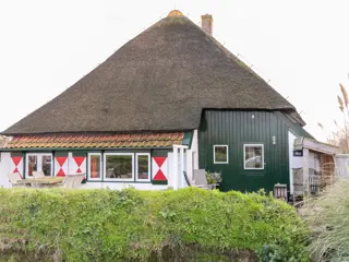 Zonnig appartement in stijlvolle stolpboerderij nabij Den Hoorn