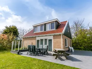 Volop genieten in deze royale luxe vakantiewoning bij het bos