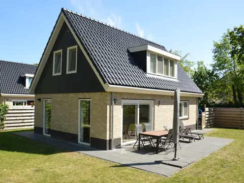 Modern luxe vakantiehuis met riante tuin gelegen in het bos