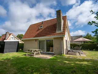 Modern vakantiehuis met riante tuin bij het bos en het dorpscentrum