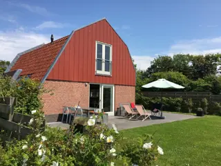 Vrijstaand modern vakantiehuis op unieke locatie nabij De Cocksdorp
