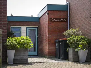Gezellig kleurrijk vakantiehuisje met privétuin in De Koog