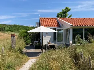 Vakantiehuis in De Koog met de duinen in je achtertuin