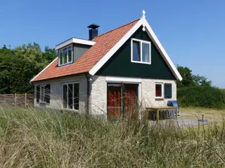 Genieten in stijl in vrijstaand luxe vakantiehuis vlakbij De Koog