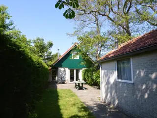 Genieten midden in het bos in ruim vakantiehuis met tuin