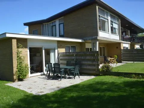 Appartement met zonnige tuin bij het bos en nabij dorpscentrum