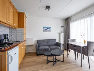 Comfortabel appartement met parkeerterrein in De Koog