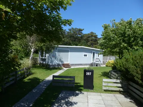 Onthaasten in gezellig chalet rustig gelegen aan de rand van De Koog