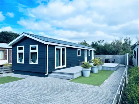 Comfortabel chalet op park bij De Koog