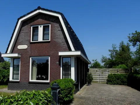 Sfeervol en luxe vakantiehuis met mooi weids uitzicht bij Den Burg