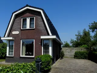 Sfeervol en luxe vakantiehuis met mooi weids uitzicht bij Den Burg