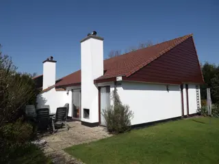 Ruim vakantiehuis met binnen- en buitenhaard in het bos