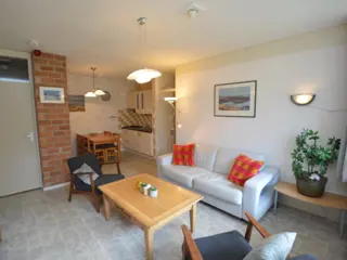 Licht appartement aan de tuinzijde bij de Koog