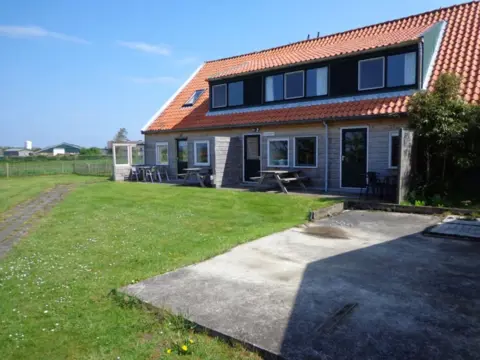 Nabij Den Burg een geschakelde vakantiewoning met te gek uitzicht