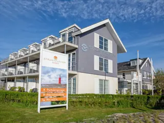 Ruime Juttersuite op de eerste etage vlakbij dorpscentrum en strand