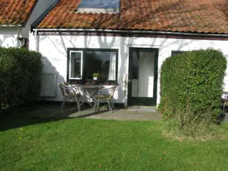 Ontspannen in knus vakantiehuisje tussen Texelse weiden