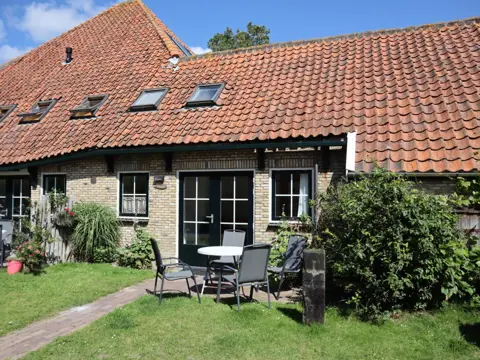 Sfeervol appartement in voormalige boerderij midden in Den Hoorn