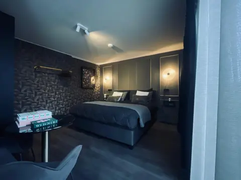 Stijlvolle suite met uitzicht op zwemvijver en natuurgebied