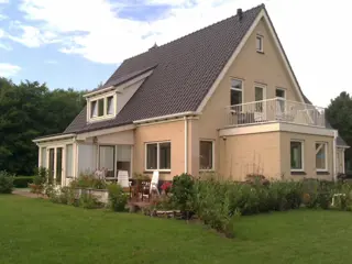 Gastenkamer op de 1e etage met weids uitzicht over de Roggesloot