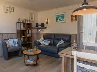 Knus vakantiehuis met opgemaakte bedden midden in De Koog