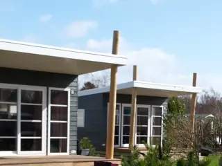 Trendy modern chalet in het bos nabij Den Burg gelegen