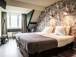 Sfeervolle kamer op de eerste verdieping aan de voorkant van het hotel
