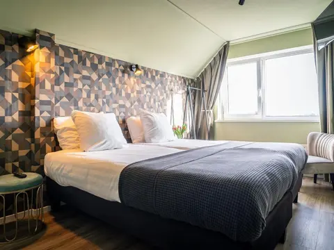 Sfeervolle kamer op de eerste verdieping