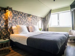 Sfeervolle kamer op de eerste verdieping