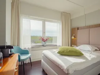 Eenpersoons kamer op loopafstand van dorpscentrum en strand