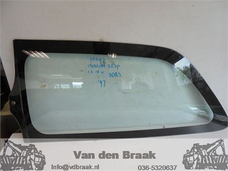 Mazda 323P 3 deurs 1997-2001 Zijraam achter links